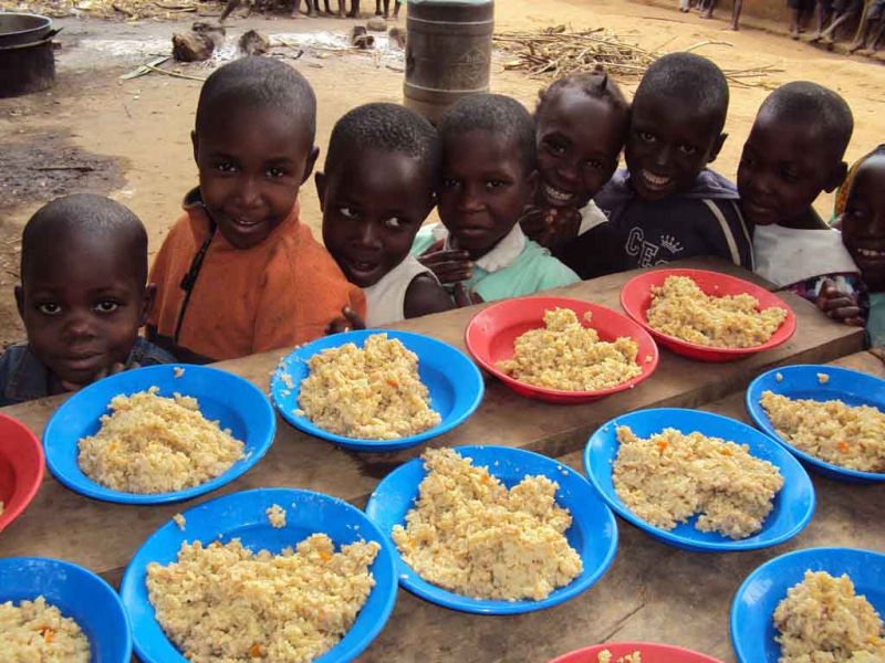Its noon and children are rushing for a meal